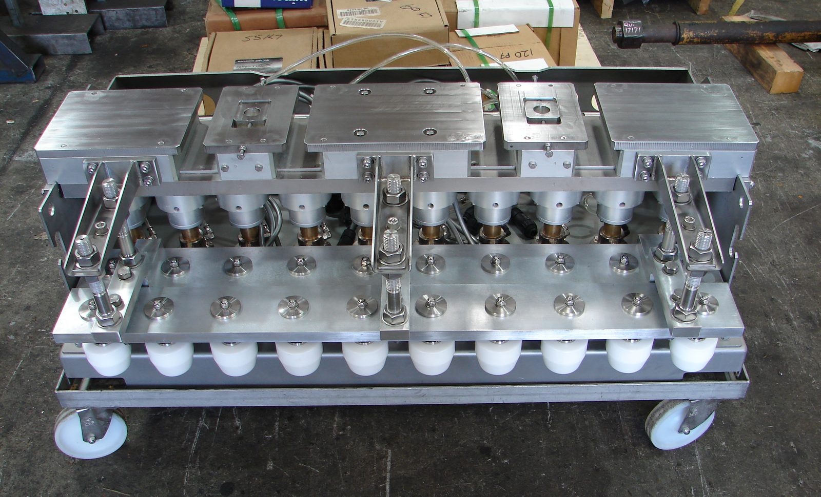 MIM Engineering precision shaft assembly on the workshop floor